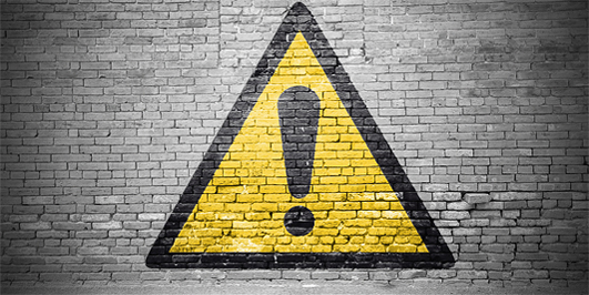 Warnschild auf Mauer, Bild: pixs:sell / Fotolia - Adobe Stock 123120521, Bearbeitung: Universitätsbibliothek